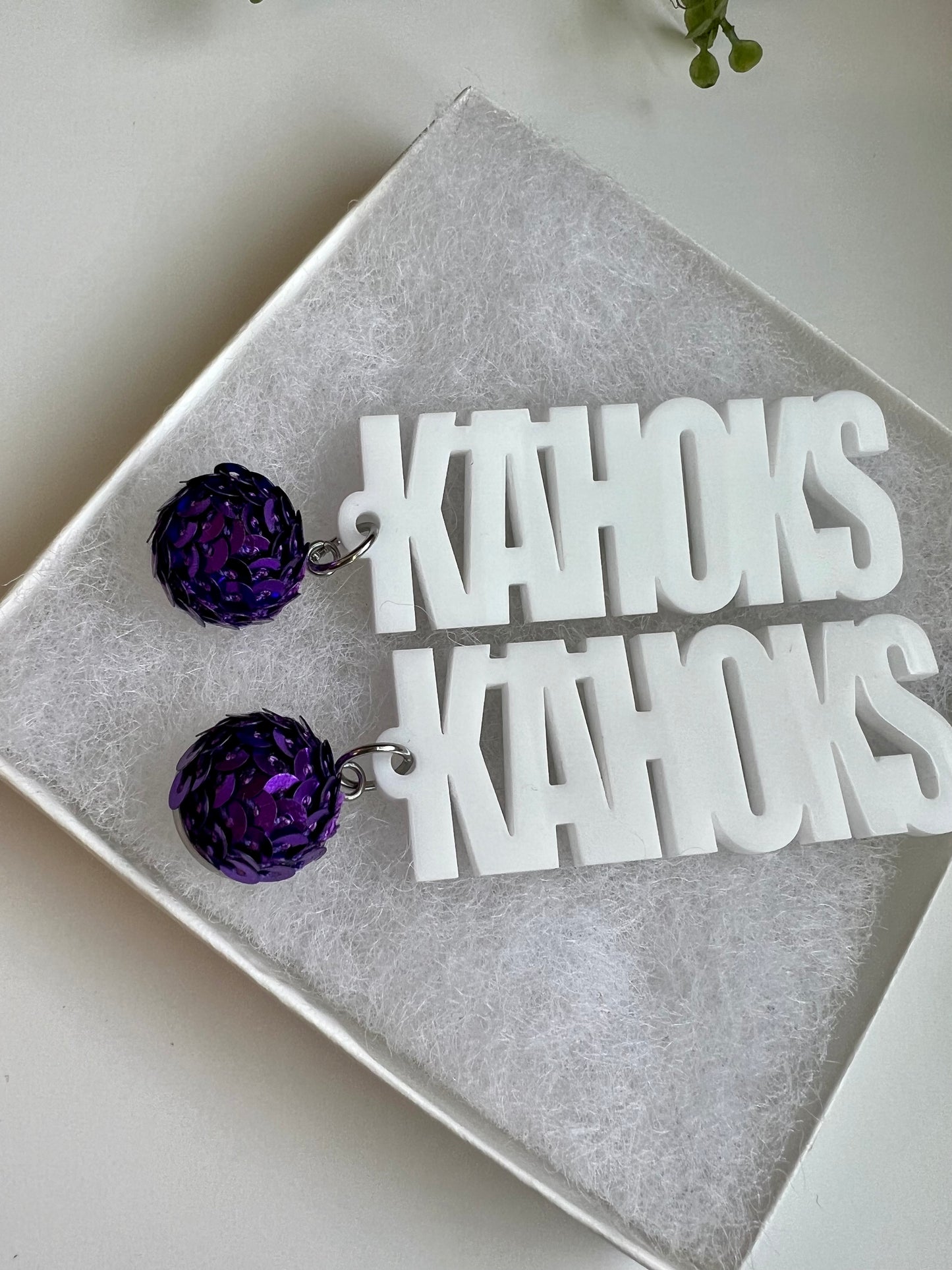 Kahok earrings. White with purple sequin top.